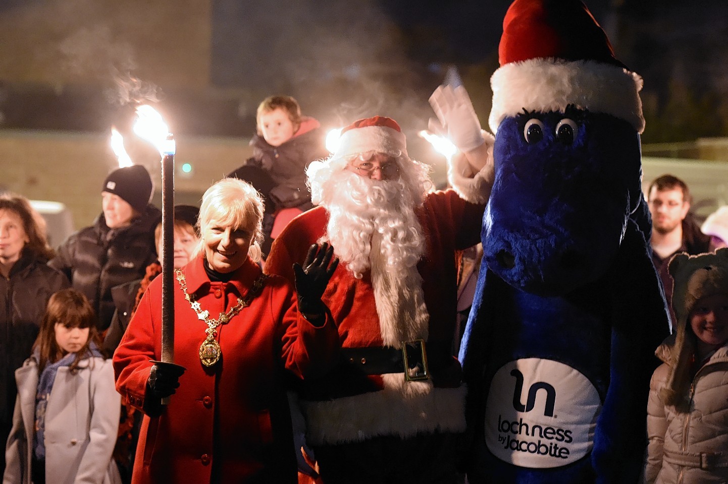 VIDEO 5,000 march in torchlit parade through Inverness for Christmas
