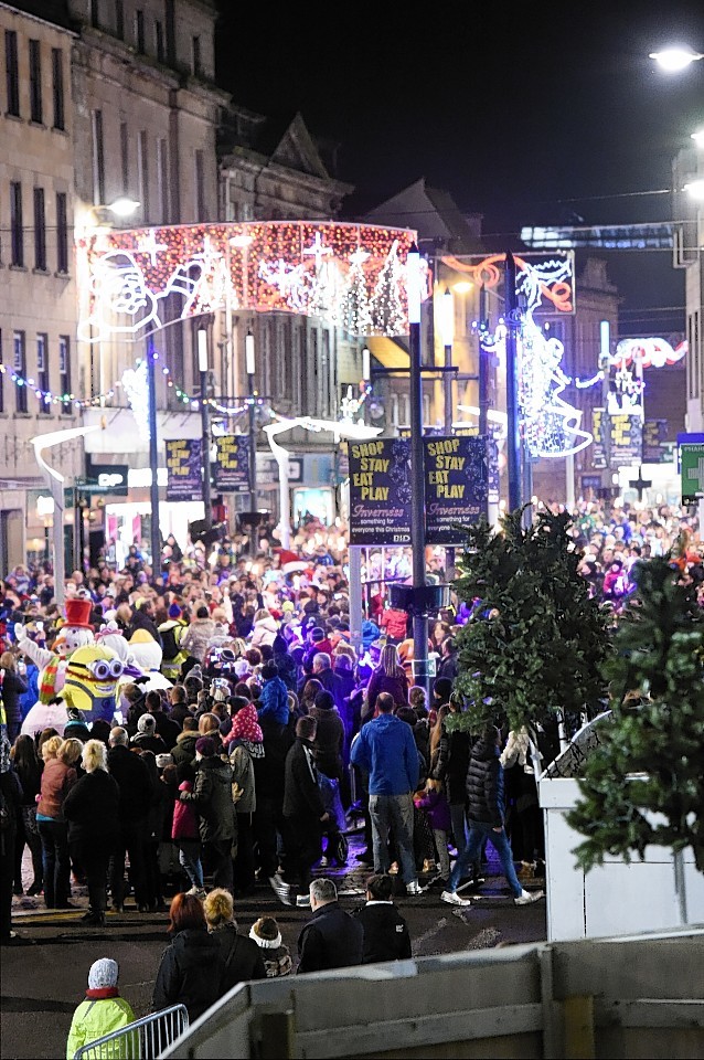 VIDEO 5,000 march in torchlit parade through Inverness for Christmas