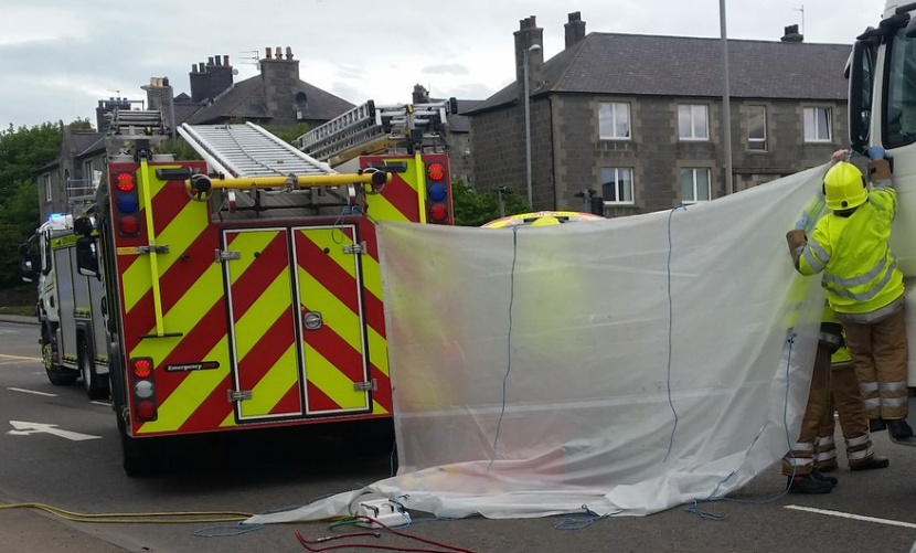 Woman trapped underneath lorry after accident on busy Aberdeen road ...