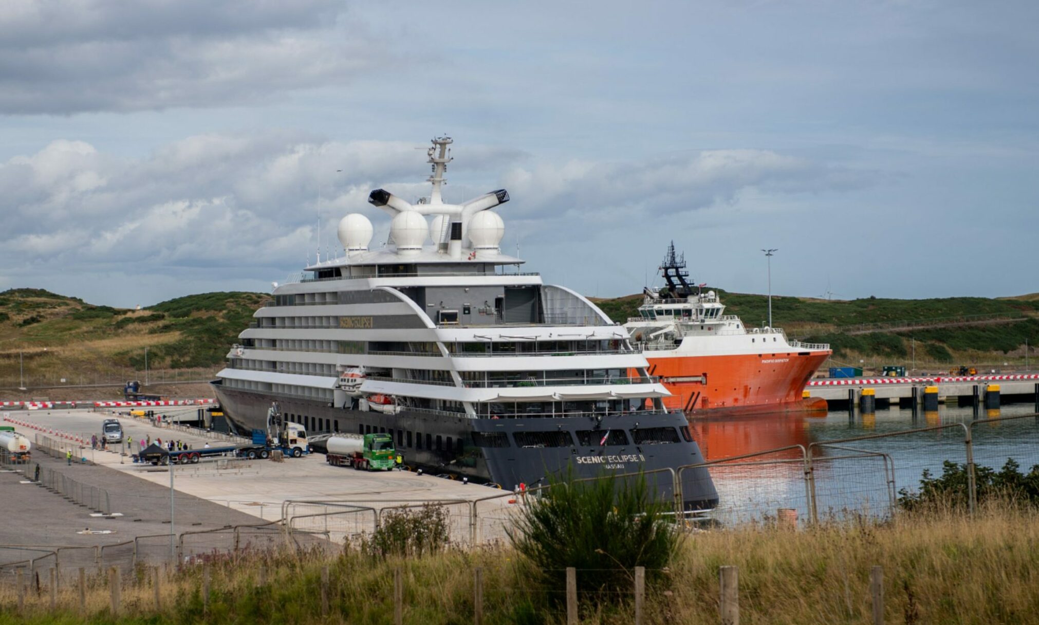 Look inside life on ultra-luxury yacht with submarine, TWO helicopters and personal butlers as it visits Aberdeen